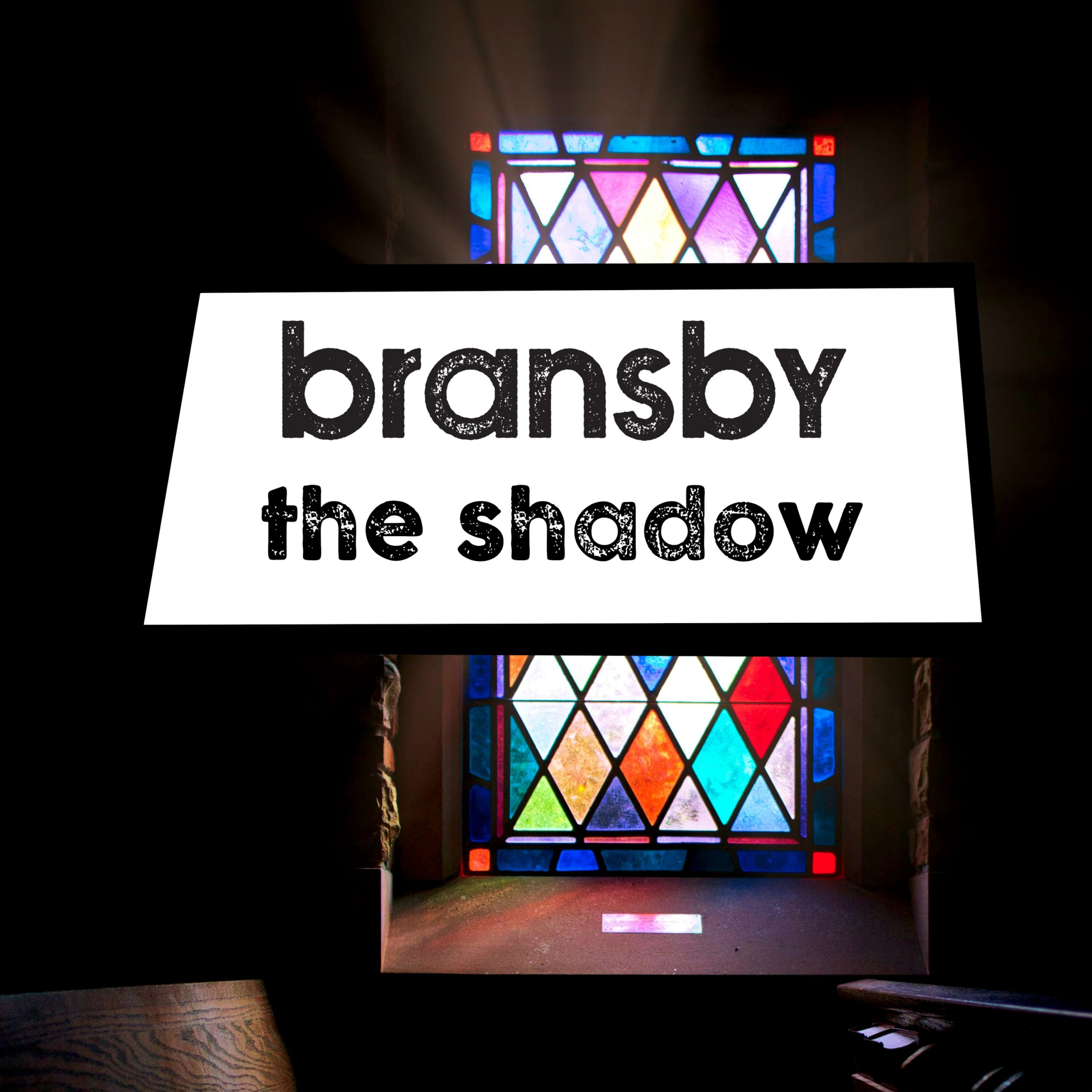BransbyTheShadowCOVERART cover art for Bransby - The Shadow,shows light streaming through a colourful stained-glass window in church